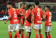 ياسر إبراهيم ورامي ربيعة مع لاعبي الأهلي