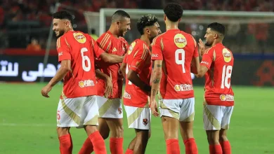 ياسر إبراهيم ورامي ربيعة مع لاعبي الأهلي